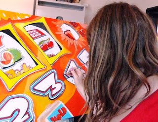 Norfolk Seaside Artist Jane Hall Puts The Finishing Touches To A Fruit Machine Painting