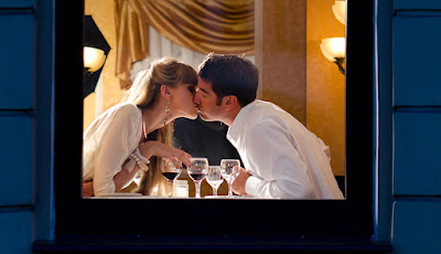 The Most Romantic Songs to Play during a Dinner Date man woman kissing 