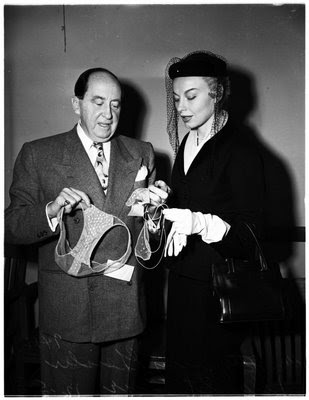 Lili St Cyr confers with her attorney at her 1951 indecent exposure trial