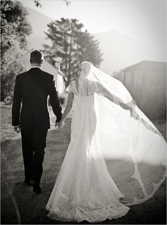 I think this photo is stunning I really want a beautiful long veil