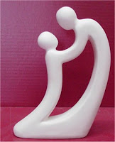 http://web.ivenue.com/rrceramics/images/StatueFatherChild.jpg
