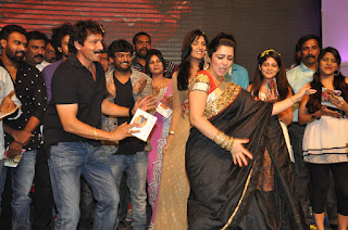  Charmi Dance At Jyothi Lakshmi Audio Launch Photos