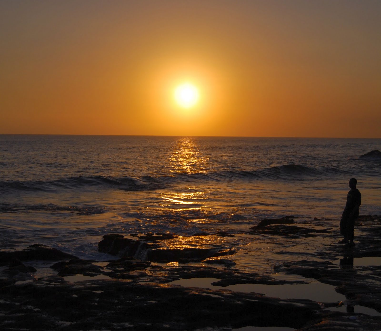 ... experience - catching the beautiful sunset scene in Tanah Lot, Bali