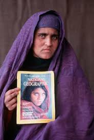 afghan girl with green eyes of national geographic fame, original photo, aged in her 40s