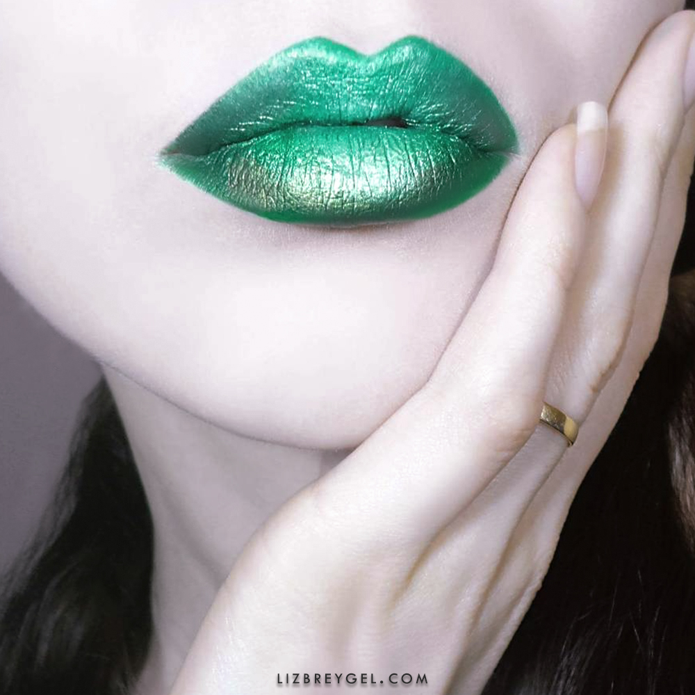 close-up of bold, emerald lip look
