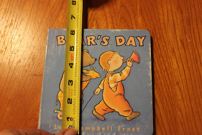 Recycled crafts:  boardbook diy Photoshop teacher measuring height of book