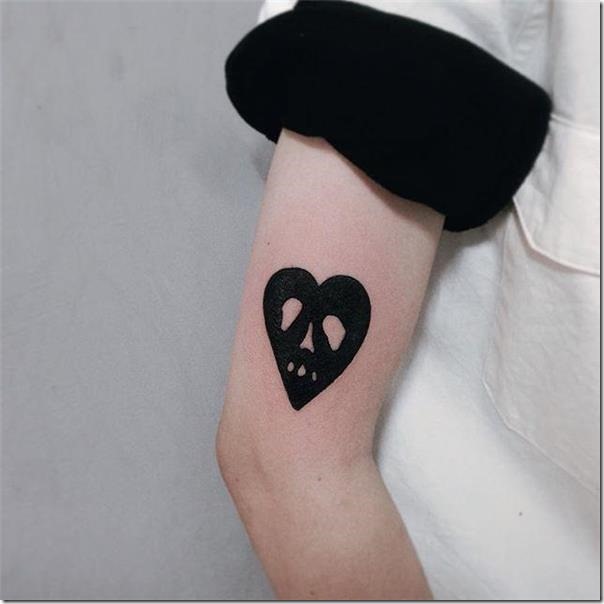 combine-dos-elementos-en-un-solo-tatuaje-el-corazn-y-la-calavera