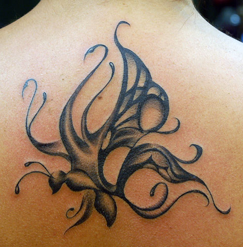 tribal butterfly tattoo back