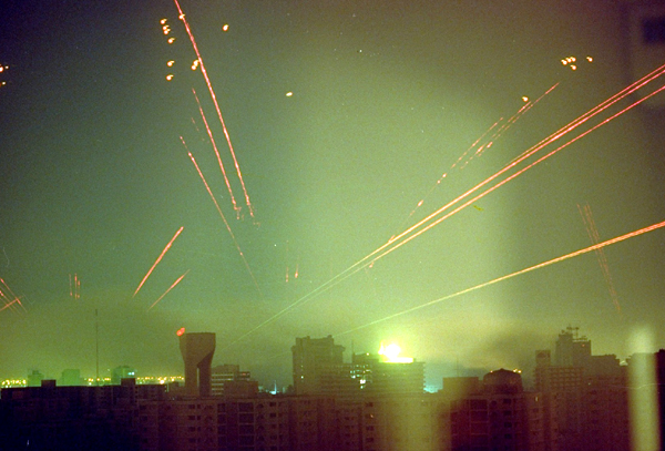 The sky above Baghdad is filled with anti-aircraft fire as U.S. warplanes attack Iraq's capital on the morning of January 18, 1991.