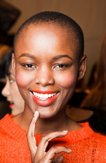 pink lipstick on dark skin. One has quiet a dark