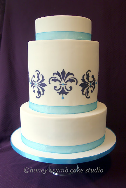The wedding colors were turquoise and deep plum so I stenciled the damask 