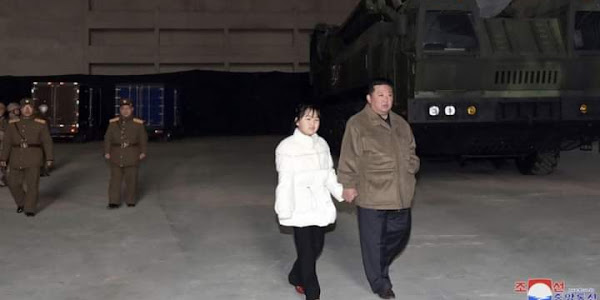 Photostory: Kim Jong Un Steps Out With Daughter For Missile Launch  