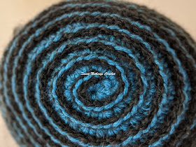 Sweet Nothings Crochet free crochet pattern blog, free crochet pattern for a spiral beanie, photo detail of the spirally back of the beanie,