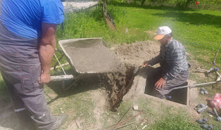 Pouring cement into the foundations