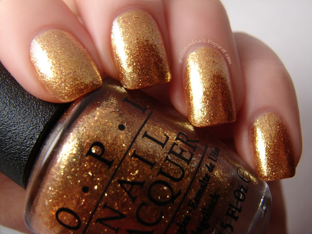 nails nailart nail art polish mani manicure Spellbound Happy New Year tape taped red gold glitter shimmer James Bond The Spy Who Loved Me Goldeneye OPI Skyfall Collection metallic flaky flakies holiday 007