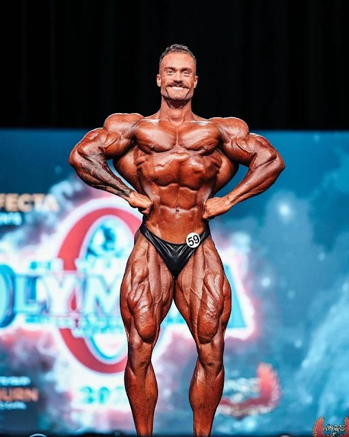 Cbum on stage in Mr Olympia 2022