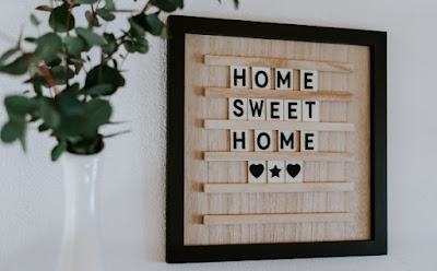 Home interiors sign saying home sweet home 