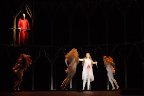 Gounod: Faust - Andreass Bauer (Mephistopheles), Marina Rebeka (Marguerite) & dancers (Photo: Agnese Zeltina (c) Latvian National Opera and Ballet)