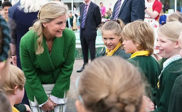 Countess of Wessex wore a Linda wool blend emerald-green blazer by Giuliva Heritage, and checked straight-leg trousers by Victoria Beckham