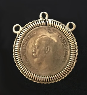 Медальйон дукача з медаллю