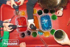 color science experiment in the sensory table