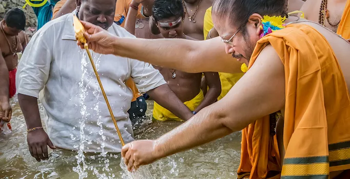 Bathing the Vel at Sungai Batu River during Thaipusam