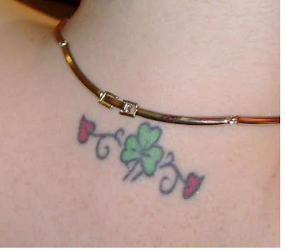 sexy tattoos, shamrock tattoo, stomuch tattoos, tattoos for women,