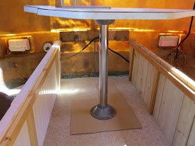 trailer table with a post and flange system