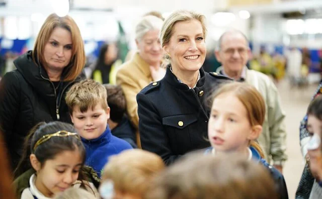 Sophie, Duchess of Edinburg wore a logo buckle belted wool jacket by Bally for visit to Yeo Valley Farm and Organic Garden