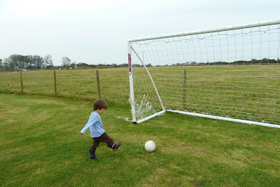 playing football at Croft Farm Cottages