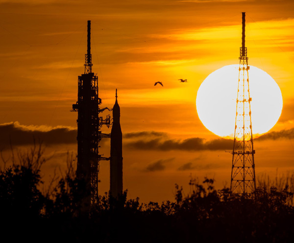 The Sun rises on NASA's Space Launch System rocket at Kennedy Space Center's Pad 39B in Florida...on August 31, 2022.