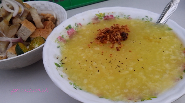 Lugaw or congee (rice porridge) commonly referred as poor man's meal. Only Php 12 and your tummy is somehow satisfied, then ask for free glass of water. Seasoned with pepper, patis (fish sauce) and kalamansi. Optional  add-on: egg, tokwa't baboy or lumpia.