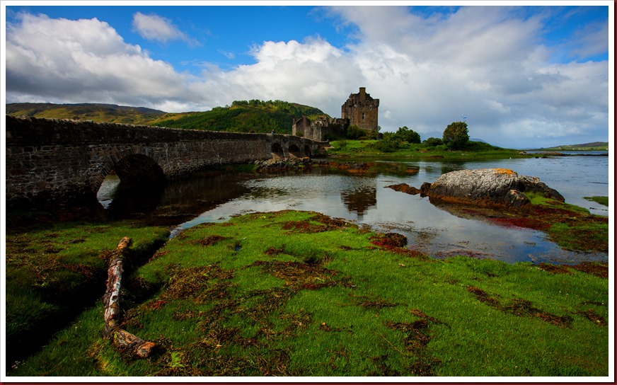 The bridge gives access to the island on which the castle stands. Photo of The bridge which gives access to the island on which the castle stands.