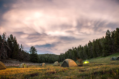 tents in a mountain meadow