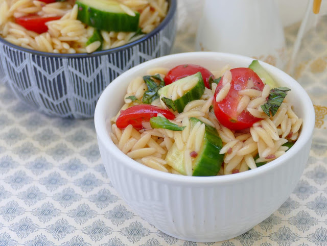 This simple spring or summer orzo pasta salad couldn't be any easier! The tomatoes, basil and cucumber combined together adds the perfect taste and texture to the orzo, and the vinaigrette dressing is the perfect finishing touch. Great side for lunch, dinner, any picnic, BBQ or potluck!