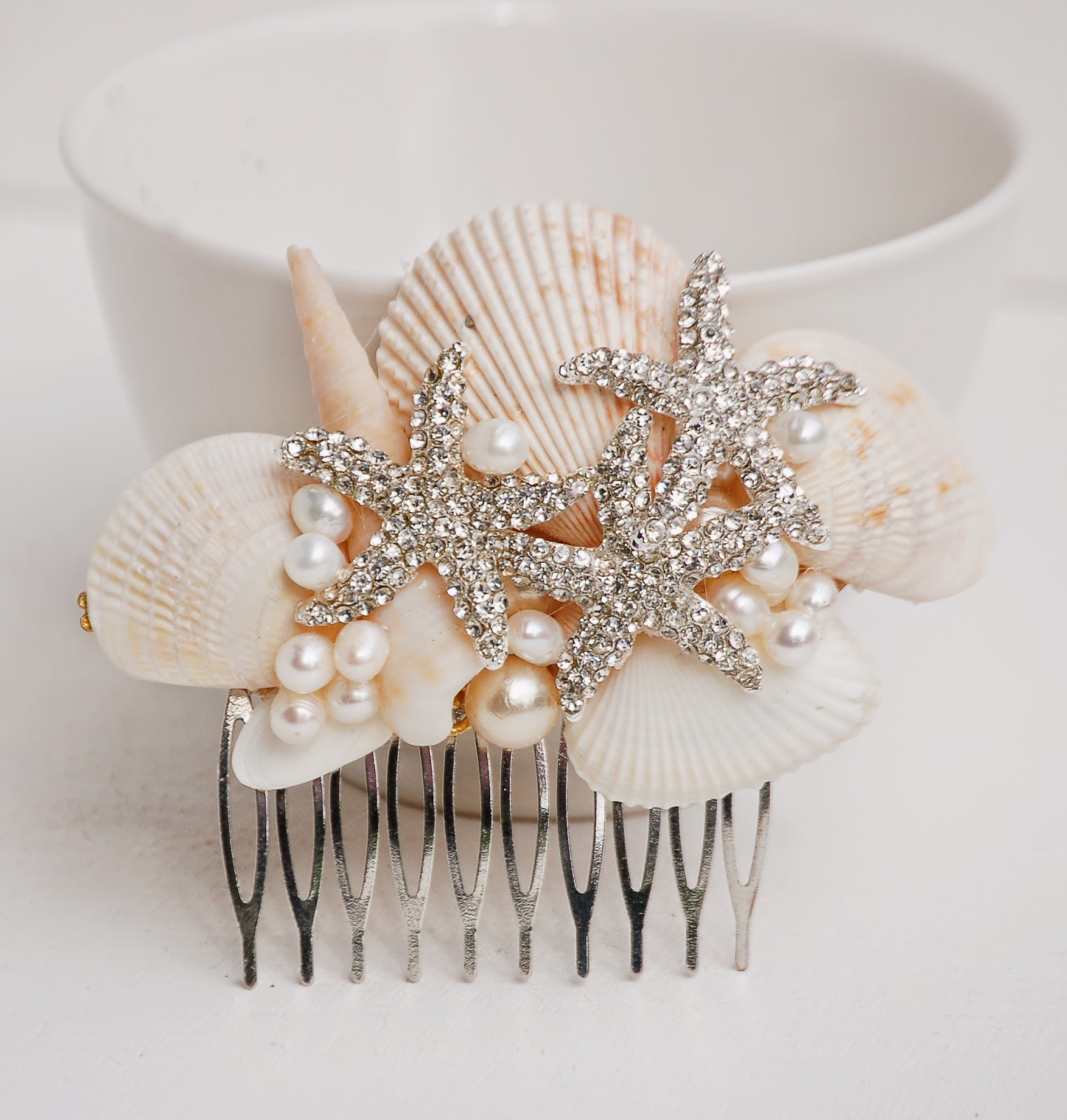 https://www.etsy.com/listing/224615160/bridal-hair-comb-sea-shell-hair?ref=shop_home_active_2&ga_search_query=shell