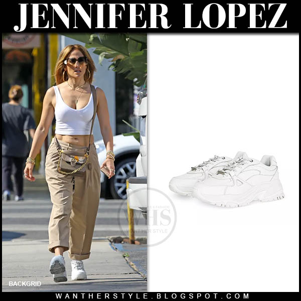 Jennifer Lopez in white crop top, khaki pants and sneakers