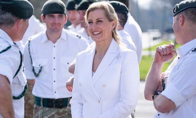 The Countess of Wessex wore a new white Indiana jacket by Altuzarra, and tweed side-drape midi skirt by Victoria Beckham