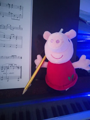 cute peppa pig toy with pencil