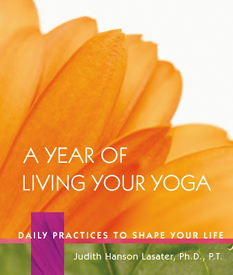 Book called A Year of Living your Yoga, Yellow sunflower