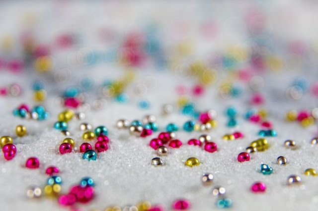 Scattered colorful beads.