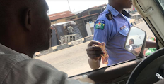 Policeman caught on camera collecting bribe