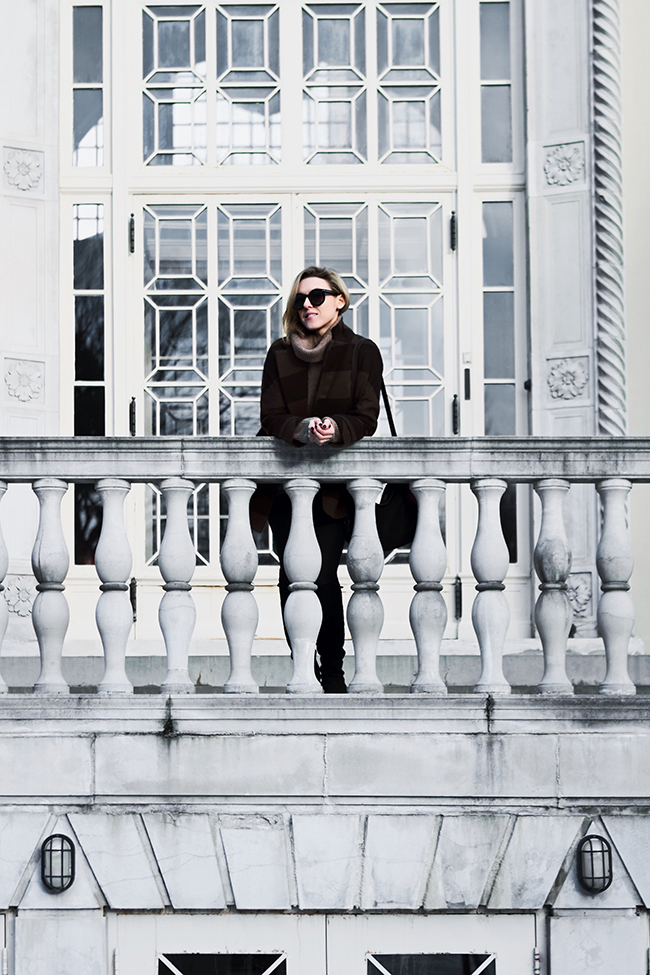 Outfit of the day by Victoria of thewindofinspiration.com, wearing Asos Striped Coat, Ralph Lauren Chunky Sweater, Pieces Jeggings, Charles by Charles David Over the Knee Boots, Eileen Fisher Suede Bag, Asos Sunglasses, Michael Kors Fur Pom-Pom Keychain.