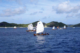 boats sailing around islands