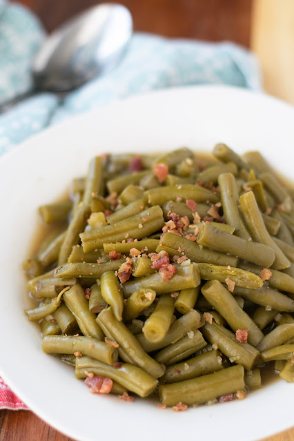 A bowl of the dressed up canned green beans.