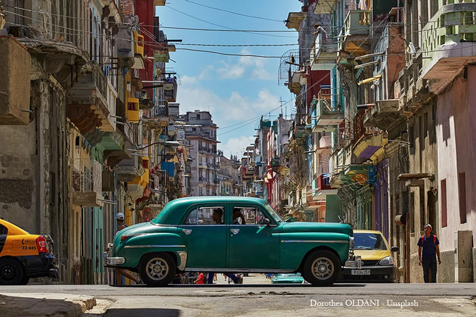 Green classic car in Havana