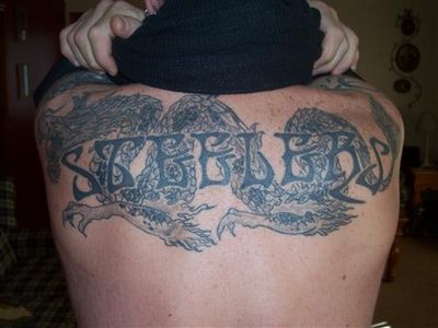 Labels Upper Back Tattoos