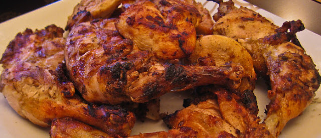 Grilled chicken thighs served in a dish