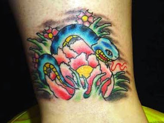 http://allaboutbodyart.blogspot.com/ snake_tattoo_astrology_tattoo_design_leg_tattoos