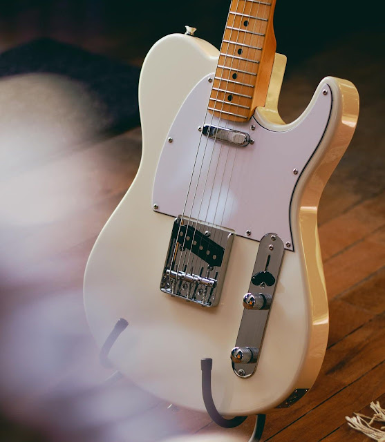 Vintage white Stratocaster guitar